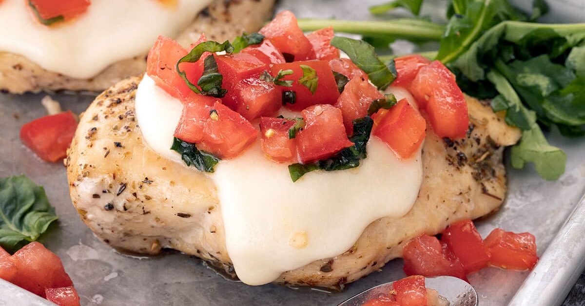 Margherita Chicken on a baking sheet.