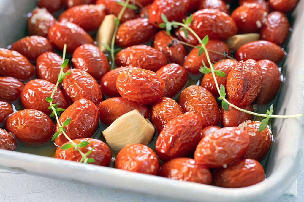 Cherry Tomato Confit on a baking sheet.