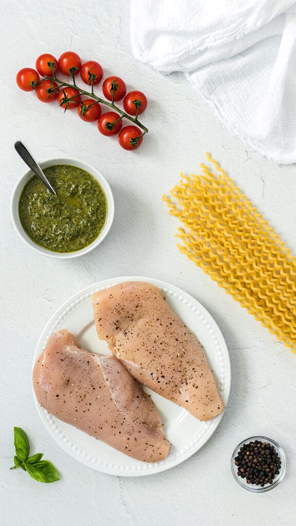 Ingredients to make pesto pasta.
